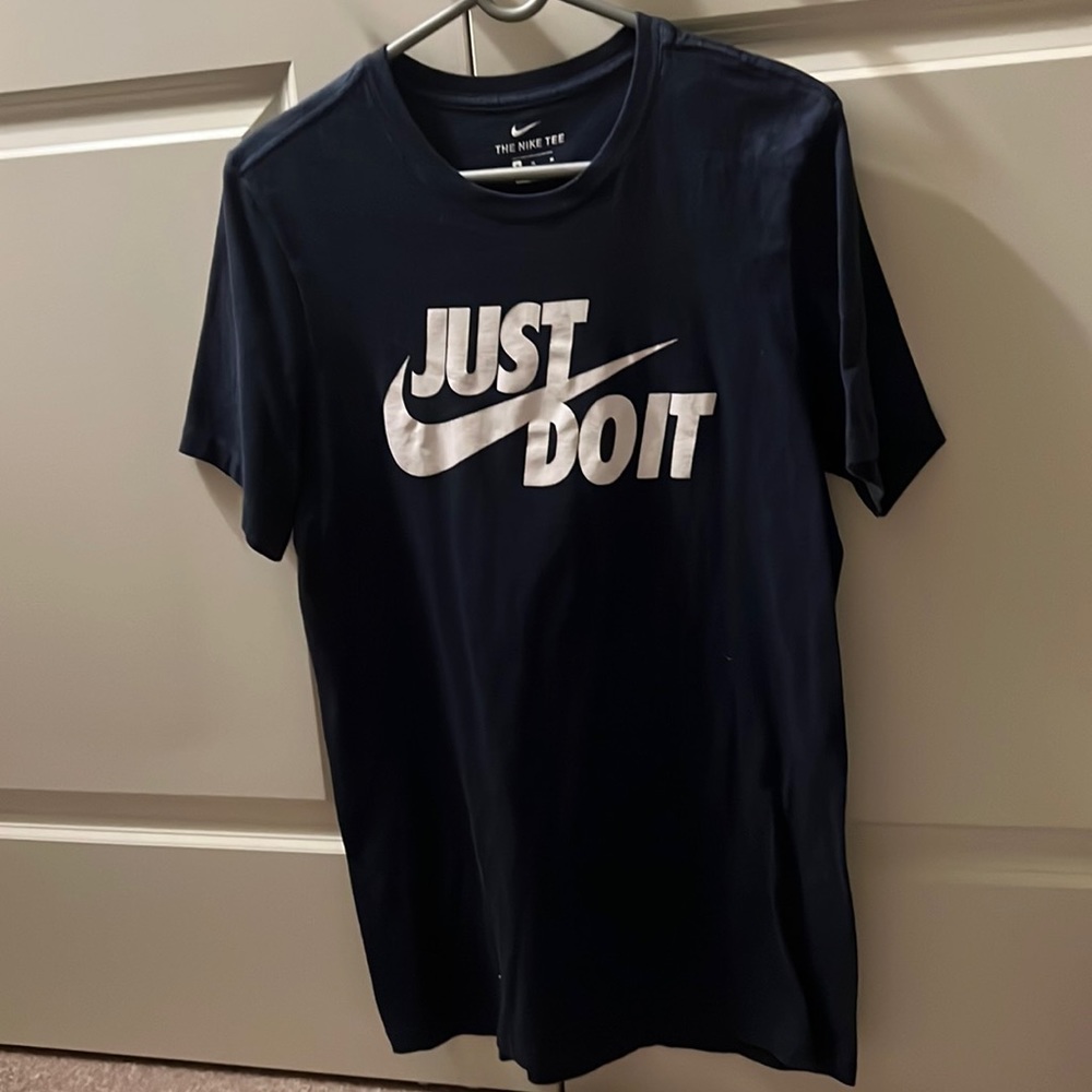 M blue Nike shirt
